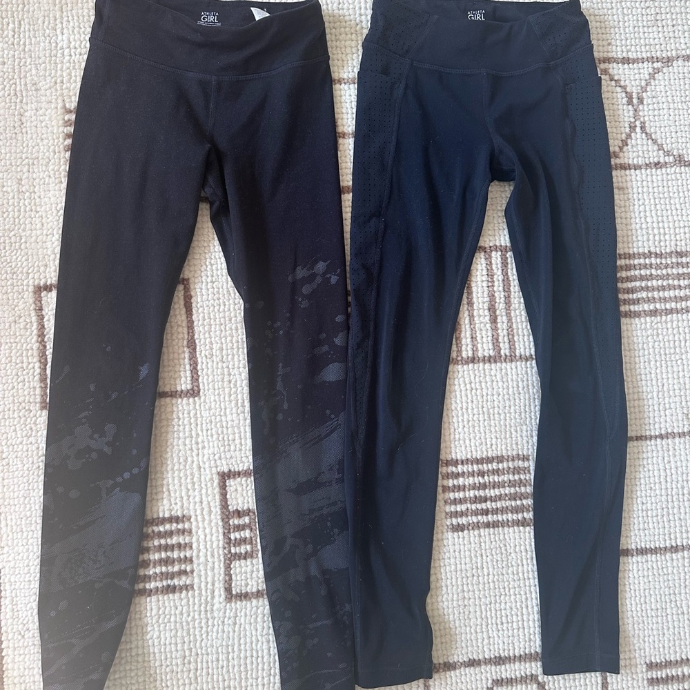 Two pairs Athleta girls black leggings size 8-10 medium